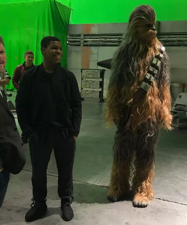 John-Boyega-at-the-Pinewood-Studios-to-meet-Harry-and-William-as-they-tour-the-Star-Wars-set.jpg