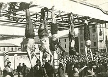 220px-Mussolini_e_Petacci_a_Piazzale_Loreto,_1945.jpg